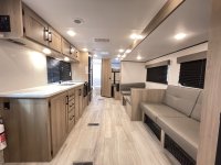 2025_keystone_coleman_light_26bx_kc12507756_impel-capture_close-up_living-area-main-1.jpg